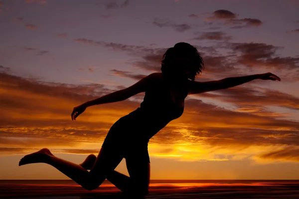 Silhouette woman on one knee hands out — Stock Photo, Image