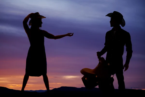 Silhouette woman cowgirl hand out — Stock Photo, Image