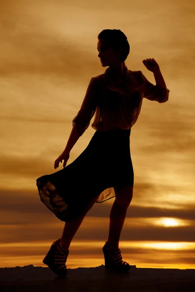 Silhouette woman sheer skirt look back — Stock Photo, Image