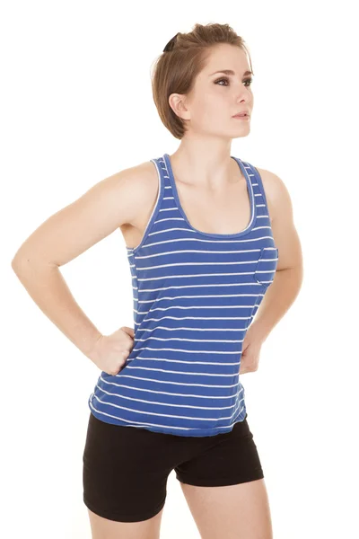 Vrouw blauw gestreepte tank fitness kijken kant — Stockfoto