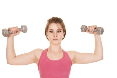 Kadın pembe kolsuz bluz yukarı ağırlıkları ile flex