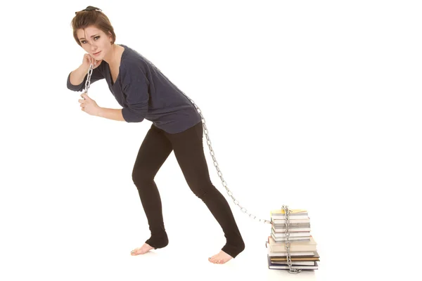 Woman pull books with chain — Stock Photo, Image