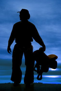 siluet man holding eyer yan bakmak