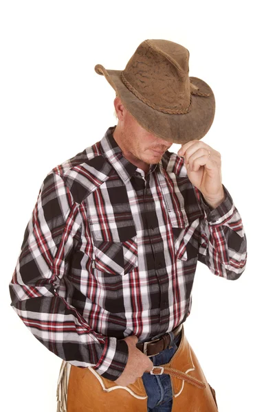 Cowboy hoed over ogen hand in riem — Stockfoto