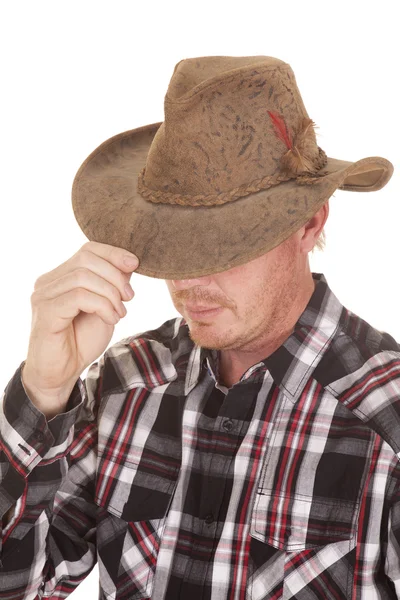 Cowboy segurar borda do chapéu sobre os olhos — Fotografia de Stock