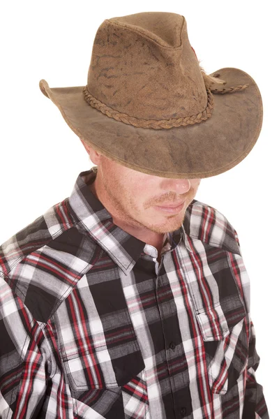 Cowboy head close hat over eyes Stock Picture
