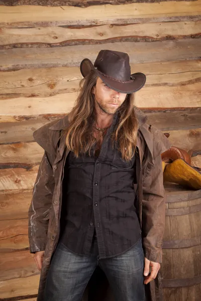 Cowboy longo cabelo espanador olhar — Fotografia de Stock