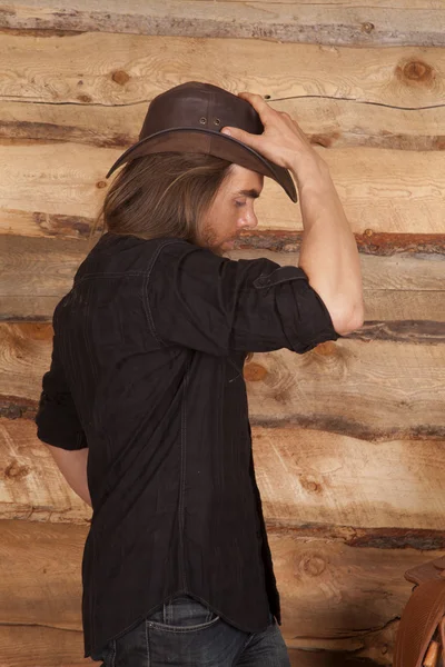 Cowboy long hair side by wood — Stock Photo, Image