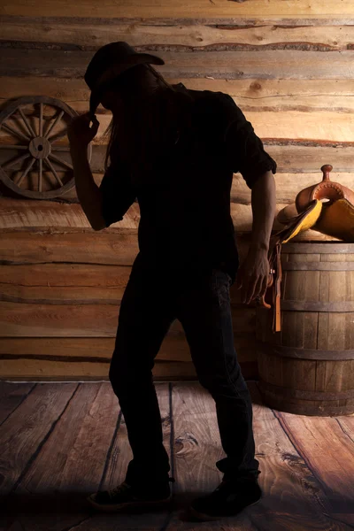 Silhouette Cowboy Hand Hut Sattel Hintergrund — Stockfoto