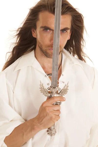 Man long hair sword in front of face — Stock Photo, Image