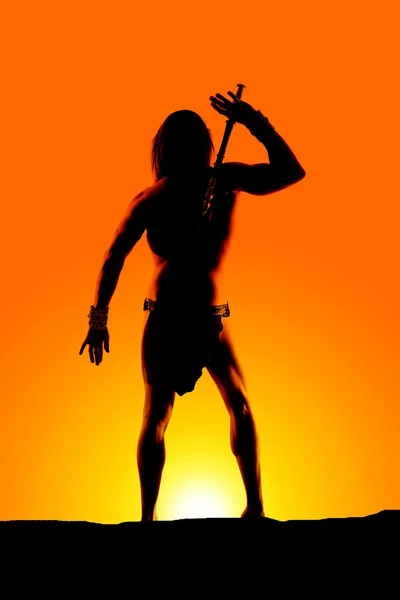 Silhouette Mann Lendenschurz Hand nach oben — Stockfoto