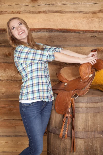 Woman lean back hold saddle horn — Stock Photo, Image