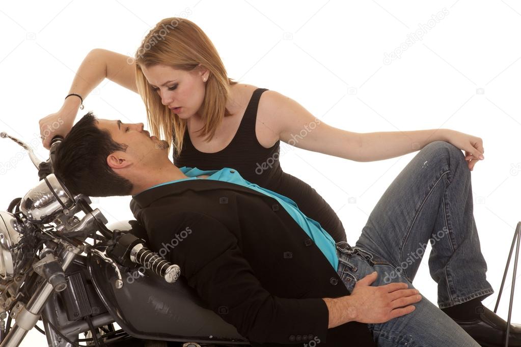 mam lay back on motorcycle woman lean down