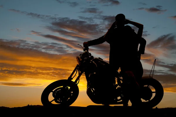 Couple on motorcycle her hands up — Stock Photo, Image