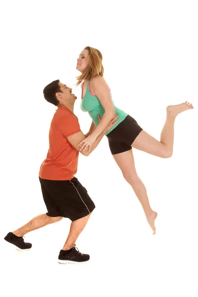 Man help woman jump — Stock Photo, Image