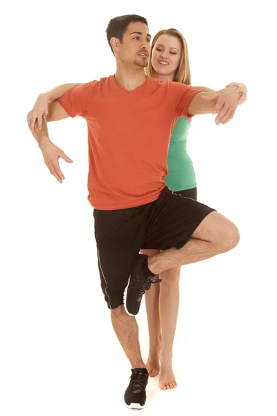 Mulher ajuda homem com posição guindaste — Fotografia de Stock