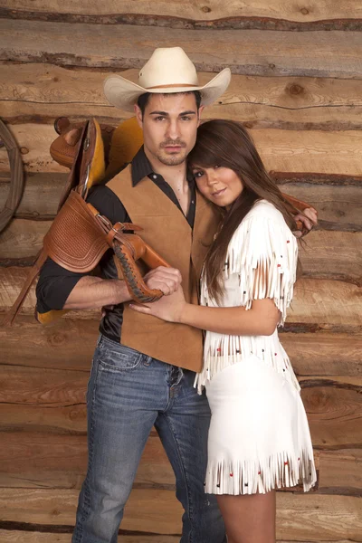 Cowboy e donna indiana sella sul retro sia guardare — Foto Stock