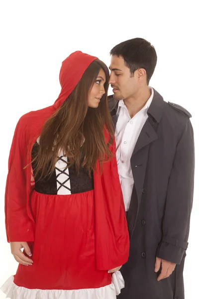 Man and red riding hood gazing — Stock Photo, Image