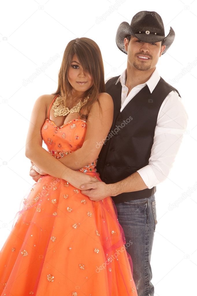 cowboy woman orange dress dance arms around