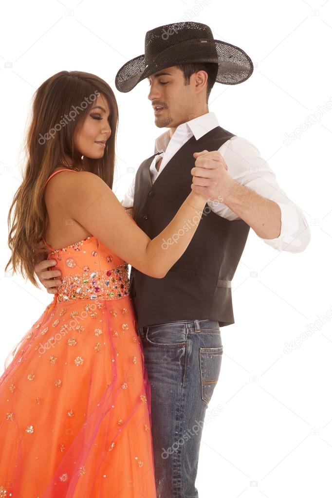 Vaquero mujer naranja vestido danza cerrar — Foto de stock