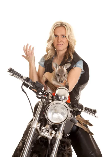 Woman on motorcycle with kangaroo confused — Stock Photo, Image