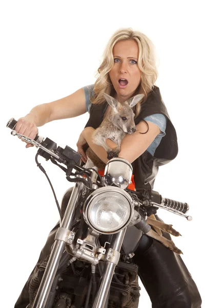 Woman on motorcycle with kangaroo shocked — Stock Photo, Image