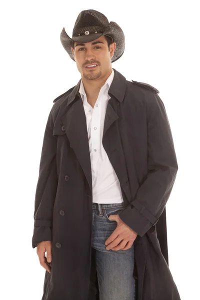 Cowboy in coat hand in pocket — Stock Photo, Image
