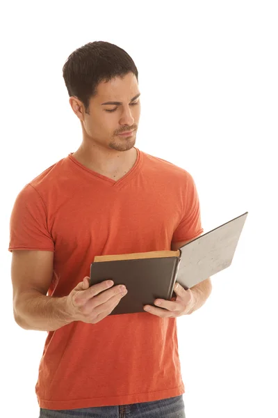 Hombre camisa naranja leer libro —  Fotos de Stock