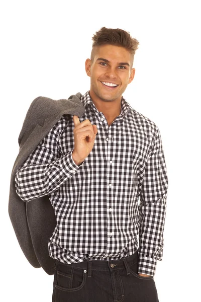 Hombre en camisa a cuadros chaqueta sobre hombro sonriendo —  Fotos de Stock