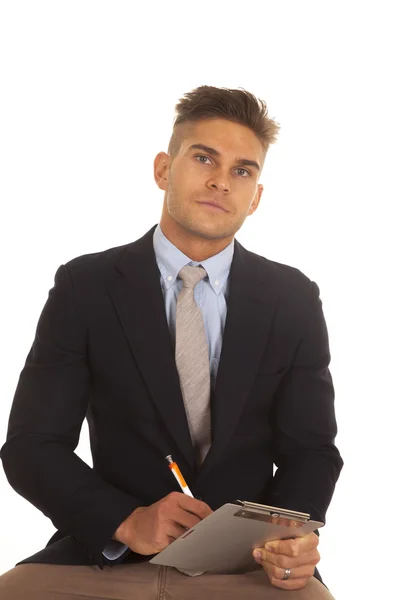 Man in suit notepad look up — Stock Photo, Image