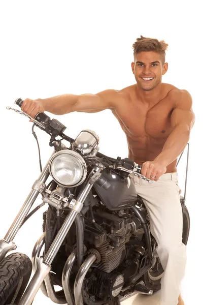 Man no shirt on motorcycle big smile — Stock Photo, Image