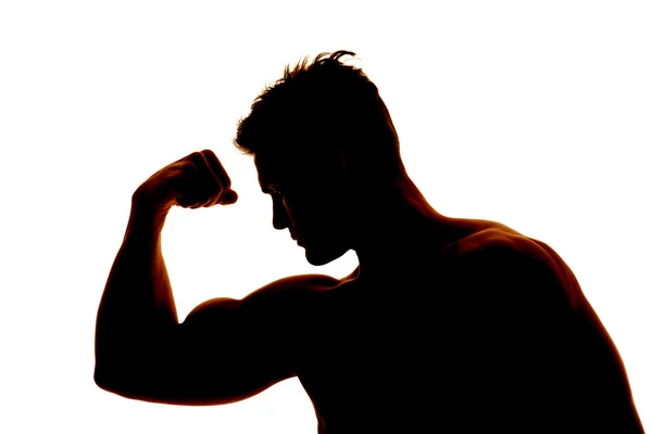 Silhouette wet man muscles flex one arm — Stock Photo, Image