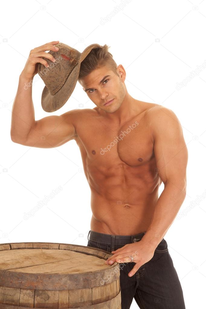 Man strong nos shirt barrel hat by head