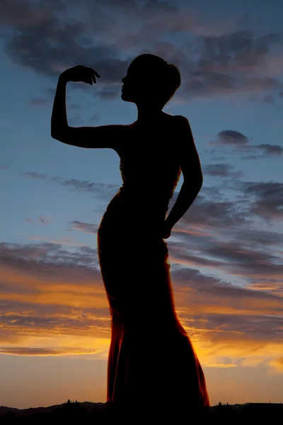 Silhouette donna curva mano in su — Foto Stock