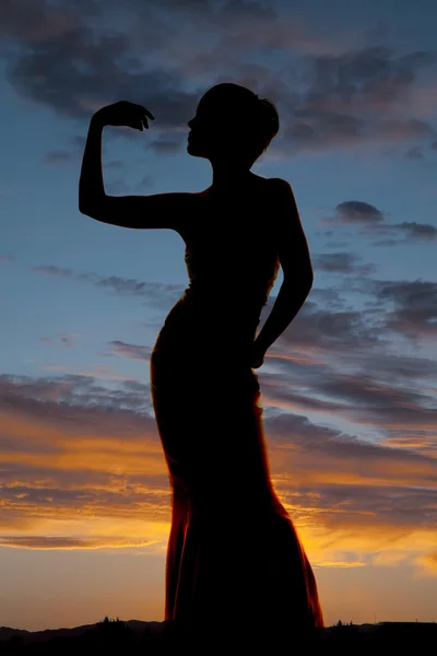 Silueta mujer curva mano arriba —  Fotos de Stock