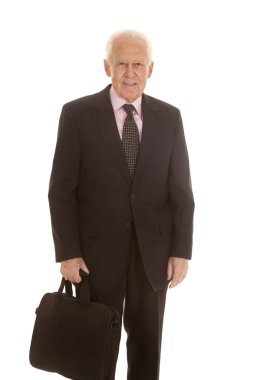 yaşlı iş adamı tutmak çanta gülümseme