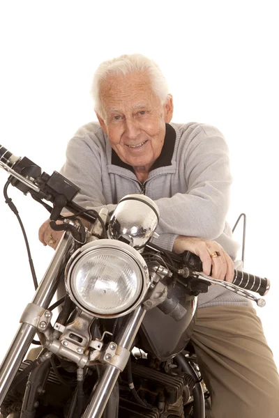 Elderly man on motorcycle close smile — Stock Photo, Image