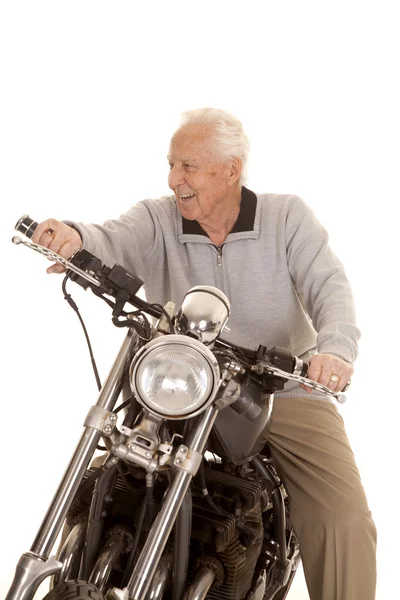 Anciano hombre en motocicleta mirar lado —  Fotos de Stock