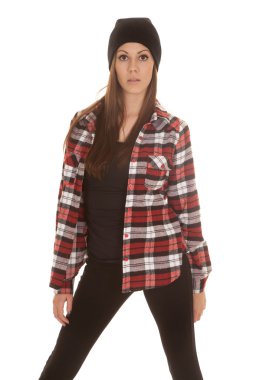 woman in beanie and plaid shirt stand serious clipart