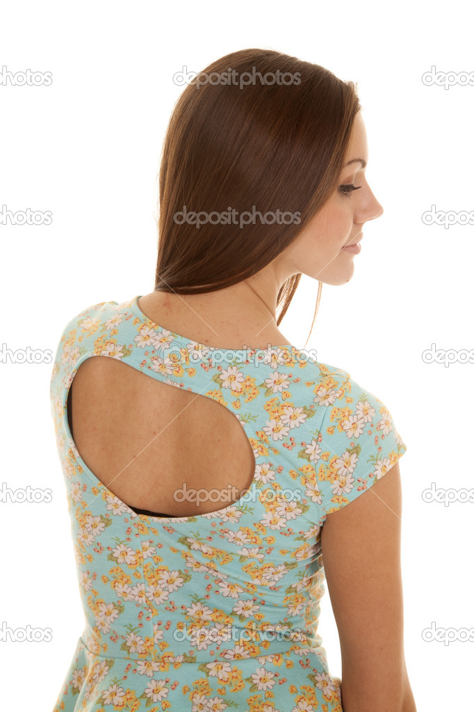woman flower shirt hold back look side