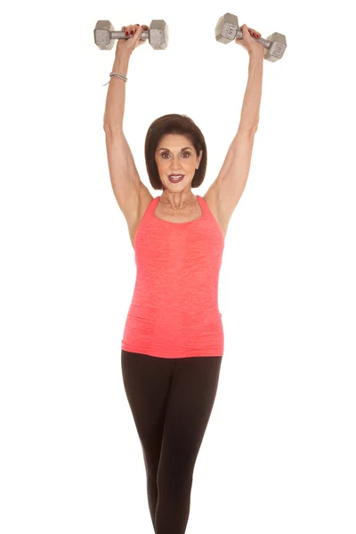 Older woman workout weights above head — Stock Photo, Image