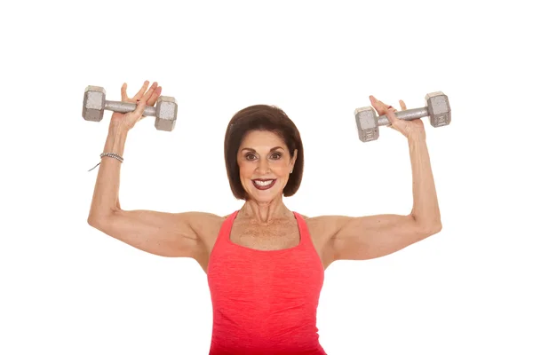 Mujer mayor entrenamiento pesos flex — Foto de Stock