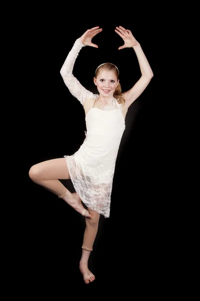 Young girl dance hands up one foot up — Stock Photo, Image