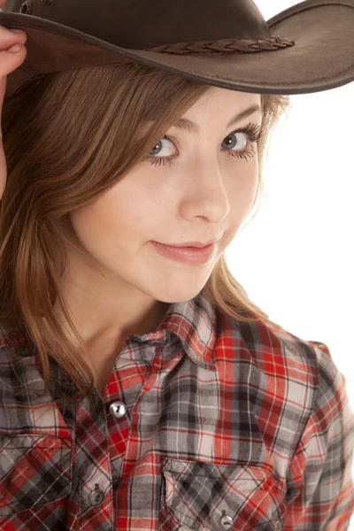Cowgirl hat plaid shirt close looking — Stock Photo, Image
