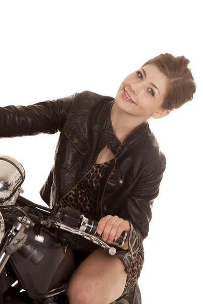 Woman leopard dress motorcycle sit lean — Stock Photo, Image