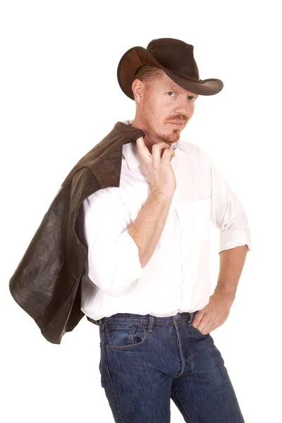 Cowboy chapéu colete sobre ombro olhar — Fotografia de Stock