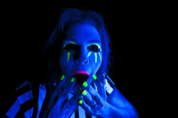 Woman black light hands over mouth — Stock Photo, Image