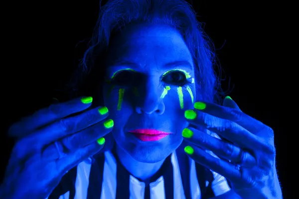 Woman black light hands by face — Stock Photo, Image