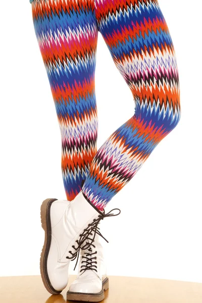 Legs colorful pattern white boots stand one toe — Stock Photo, Image