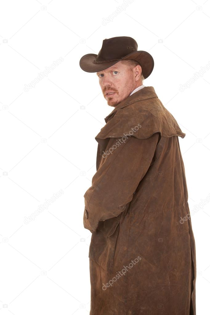 Cowboy leather duster look back afraid